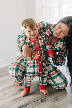 ALL SALES FINAL. No Refunds/Exchanges on Warehouse Sale items. It's time to get festively comfy with our Buttflap PJs - Christmas Plaid! These cozy, matching PJs are just the thing for a magical family night, delivering a dose of festive cheer that no one can ignore. So break out the marshmallows, pop in a Christmas movie, and snuggle up for a night to remember! Ho ho ho! 95%polyester 5%spandex True to size Wash Delicate; Lay Flat to dry Bodysuit: Sizes newborn to12m Two Piece PantSet: Sizes 18m Christmas Pajamas Set, Plaid Christmas Photos Family Pictures, Matching Family Pajamas Christmas, Family Matching Holiday Winter Sleepwear, Family Matching Winter Sleepwear For Bedtime, Playful Christmas Sleepwear, Christmas Long Sleeve Onesie For Playtime, Christmas Long Sleeve Playtime Onesie, Christmas Long-sleeve Playtime Onesie