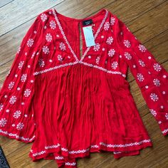 Nwt Beautiful Boho Embroidered Top. Perfect Condition. Size M. Red Bohemian Embroidered V-neck Top, Red Embroidered V-neck Blouse, Red Embroidered Top With Embroidered Hem, Red Long Sleeve Cotton Embroidered Top, Bohemian Red Embroidered V-neck Top, Red Embroidered Festival Tops, Red Bohemian V-neck Embroidered Top, Red Fitted Bohemian Embroidered Top, Festive Red Top With Chikankari Embroidery