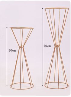 an image of a side table with measurements for the top and bottom, shown in gold