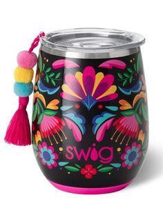 a colorful cup with a tassell on the side and a pom - pom