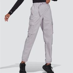 Nwt Adidas Women's Cargo Pants. Belted Elastic Waist With Buckle Closure. 100% Nylon Ripstop. Side Pockets. Cargo Pockets With Flap Closure. Back Pocket With Hook & Loop Closure. Elastic Cuffs. Silver Dawn (Soft Lavender)/Black. Machine Wash. Adidas Cargo Pants, Adidas Cargo, Adidas Hose, Adidas Sweats, Pants Adidas, Nike Acg Jacket, Adidas Joggers, Red Blazer, Women Cargos