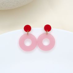 Lasered circle earrings made of acrylic. The earrings are lovingly handmade in our studio. We used shiny and semi-gloss acrylic and well tolerated stainless steel stud earrings. Dimensions: 3 cm long x 2.2 cm wide. The earrings are particularly light. Trendy Red Circular Jewelry, Minimalist Red Round Earrings, Trendy Red Resin Earrings, Modern Red Round Earrings, Pink Circle Earrings As A Gift, Pink Circle Earrings For Gift, Modern Round Resin Earrings, Pink Circle Earrings For Gifts, Circle Stud Earrings