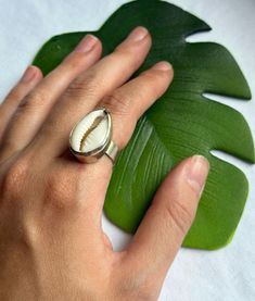 Bali inspired sterling silver shell ring Unique Shell Jewelry For Gifts, Unique Shell Jewelry Gift, Silver Shell-shaped Ring For Gift, Elegant Rings For Summer Beach Occasions, Ocean-inspired Shell-shaped Rings As Gift, Handmade Shell Jewelry As A Gift, Elegant Summer Beach Rings, Silver Shell-shaped Bohemian Jewelry, Silver Bohemian Shell Jewelry