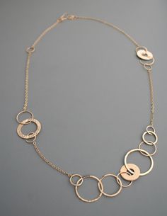 "This stunning asymmetric necklace has such a fun and modern look to it. It is completely crafted by hand from 14k gold filled metal. The links have a shiny finish which makes the necklace sparkle in the light as you move. The total length is about 25\" and the links measure between 1/4\" and 1\" wide. The chain ends in my signature handmade clasp.  Rachel Wilder Jewelry is all handmade solely by the artist. I create my designs by hand starting with straight wire which I shape, fuse, hammer and Diamond Infinity Necklace, Gemstone Pendant Jewelry, Gold Filled Necklace, Pewter Pendant, Infinity Necklace, Handmade Jewelry Designs, Valentines Necklace, Accessories Diy Jewelry, Unique Handmade Jewelry