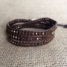 "This is a beautiful brown Bohemian beaded wrap bracelet and it would make the perfect Valentines Day gift for that special person in your life. If you're looking for a brown wrap bracelet to complete your favorite outfit you can't go wrong with this wrap bracelet. It is comfortable enough to wear all day at work and leave it on for a night out. You'll never want to take it off. This wrap bracelet is made with top quality leather cord and Czech glass beads in dark bronze. This bracelet measures Adjustable Brown Bohemian Friendship Bracelets, Adjustable Brown Beaded Bracelets For Festivals, Adjustable Bohemian Brown Friendship Bracelets, Beaded Brown Friendship Bracelets As Gift, Adjustable Brown Beaded Wrap Bracelet, Brown Beaded Friendship Bracelets As Gift, Adjustable Brown Bohemian Beaded Bracelets, Hand Wrapped Brown Beaded Bracelets As Gift, Brown Beaded Wrap Bracelet For Friendship