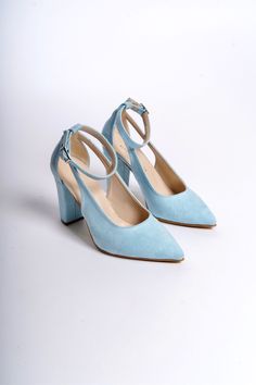 BLUE SUEDE SHOES, BLUE WEDDING SHOES, BABY BLUE SHOES, BLUE HIGH HEELS, WEDDING HEELS, BLUE BLOCK HEELS, BLUE BRIDAL SHOES, ANKLE BRIDE HEELS

As Eleanor Louise, we stand out with our Baby Blue heeled shoes that combine style and comfort. Specifically designed for brides, these shoes are crafted with high-quality materials.

• Made from Blue Suede and Premium Vegan Leather, our shoes are equipped with an ankle strap that provides comfort throughout the day.

• Completing your style and boosting your confidence is the most elegant way! Blue Suede 3.15-inch (8 cm) high-heeled shoes offer elegance and chicness with every step. Whether it's for daily wear or a special event, these shoes not only add height but also provide a sophisticated touch to your style. Blue Round Toe Wedding Shoes For Spring, Blue Pointed Toe Court Shoes For Spring, Blue Heel Strap Wedding Shoes, Blue Wedding Shoes With Heel Strap And Round Toe, Blue Closed Toe Court Shoes, Light Blue Heels With Heel Strap For Formal Occasions, Light Blue Pointed Toe Heels With 4-inch Heel, Blue Open Heel Wedding Shoes, Formal Light Blue Heels With Heel Strap