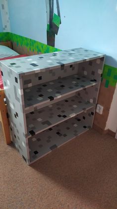 a shelf made out of lego blocks in a room