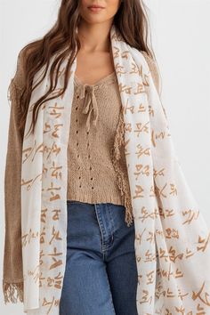 This beige shawl scarf boasts a fun hangul design, perfect for adding a touch of Korean style to your wardrobe. It's non-stretchy, see through, unlined, and oh-so stylish - a must-have for anyone wanting to up their cool factor. Don't miss out on this trendy addition to your lifestyle! 🖤 Item Features: Beige, hangul Korean languages print shawl scarf, non-stretchy, see through, unlined, stylish, cool, must-have, trendy, lifestyle. Festive Beige Embroidered Shawl, Korean Scarf, Elegant Beige Festive Scarves, Festive Beige Scarves, Elegant Embroidered Beige Scarves, Trendy Lifestyle, Long Shawl, Shawl Scarf, Korean Language