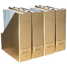 three gold file folders sitting next to each other