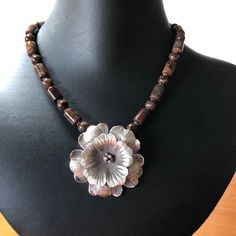 Handcrafted Artisan Necklace Made Of Brown Tubes And Round Calcite Beads With Silver Spacers, 16.5 Inches Long With Adjustable Clasp. Flower Pendant Is Semi-Oxidized Silver. Crystal Statement Necklace, Artisan Necklace, Blue Topaz Necklace, Topaz Necklace, Natural Stones Necklace, Party Necklace, Prom Jewelry, Long Chain Necklace, Pretty Necklaces