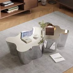 an unusual coffee table is shown in this living room