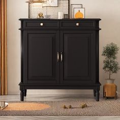 a black cabinet sitting on top of a rug