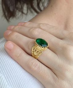 Gold Emerald Edwardian Silver Heart Ring, 925 Sterling Silver Green Quartz Gemstone Artisan Handmade Filigree Boho Women Statement Ring Dainty cocktail ring, boho wedding gift, victorian jewelry, gift ring for her, September birthstone, oval statement ring, ancient Egypt ring, birthday gift her, vintage gold ring, trendy women ring Material: 925 Sterling Silver with 18K Gold plated ( NICKEL FREE ) Gemstone: Emerald 10x14 mm. FREE, FAST AND TRACKABLE SHIPPING FOR ALL EU COUNTRIES AND USA. Elevate your elegance with the epitome of luxury - the Gold color Emerald Edwardian Silver Heart Ring. Crafted with precision and passion, this exquisite piece of jewelry is a testament to artisan craftsmanship and timeless beauty. Made from the finest 925 sterling silver, it showcases a resplendent green 22 Karat Gold Rings, Oval Gemstone Heart Ring As Gift, Oval Gemstone Heart Ring For Gifts, Victorian Ring For May Birthstone Gift, Traditional Oval Emerald Ring, Traditional Birthstone Jewelry For Anniversary, Oval Filigree Ring As Fine Jewelry Gift, Oval Filigree Ring Fine Jewelry For Gift, Oval Filigree Ring For Gifts, Fine Jewelry Style