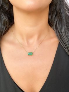 This elegant, timeless necklace features a stunning 3.76ct rich green Zambian emerald that is the focal point of the design. The emerald is set into a classic prong design that can be worn vertically or horizontally on the chain to suit any occasion. With this necklace, you can easily transition from a day in the office to a night on the town. ♥ The pendant measures 7mm in width, 13mm in length, and is 5.5mm thick. ♥ The necklace chain shown is included and measures 17.5" with a slider bead that Emerald Pendant Necklace, Gold Pendant Set, Timeless Necklace, Emerald Necklace Pendant, Zambian Emerald, Halo Pendant, Emerald Pendant, Rich Green, Yellow Gold Pendants