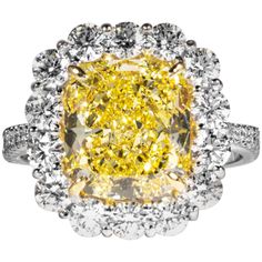 a fancy yellow and white diamond ring