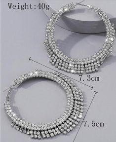 These women exaggerated rhinestone tassel big hoop earrings are a show stopper! Perfect for date night or the holidays. Pair it with your favorite dress, leather look or tank for a star studded look. Description: Color: Silver Gender: Women Material: Glass Earring Studs Materials: Stainless Steel Measurements in inches: Size Eardrop Height Eardrop Width one-size 2.9 3 Big Hoop Earrings, Star Studs, Silver Earrings Dangle, Glass Earrings, Favorite Dress, Date Night, Tassels, Hoop Earrings, Dangle Earrings