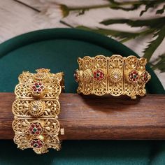 This pair of Indian bangles are perfect blend of modern luxury and traditional style. These bangles are beautifully handcrafted with utmost precision and skill. Our designers have spent hours on this piece to meet your special occasion needs. It is perfect choice for brides, pair this with your rest of the jewelry for a complete royal look. Details & Specifications: Openable kada fits 2 '4 to 2 '8 Metal Bangle Bracelets For Festivals, Yellow Gold Bracelet Jewelry For Rituals, Ornate Gold Bangle For Festive Occasions, Elegant Meenakari Bangle For Ceremonial Occasions, Yellow Gold Rituals Bracelet Jewelry, Elegant Festive Cuff Bracelet Bangle, Yellow Gold Ritual Bracelet Jewelry, Traditional Openable Jewelry For Rituals, Fusion Style Ceremonial Bangle Bracelets