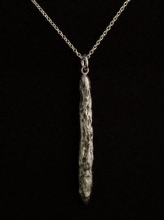 an elegant silver jewelry that represents the Oumuamua. more about Oumuamua on Wikipedia, https://en.wikipedia.org/wiki/%CA%BBOumuamua Oumuamua interstellar object pendant from solid sterling silver hand carved using the lost wax method. Size: 47mm/1.85 inch high. comes on a 18 inch/ 45 cm long sterling silver chain.If you would like a 20 inch / 50 cm long chain please leave me a note in the message to seller form when checking out. If you choose the 14k goldplated option, it comes with an 18 in Elegant Silver Jewelry, Lost Wax, Interstellar, Long Chain, Sterling Silver Chain, Solar System, Silver Chain, Arrow Necklace, Black Friday