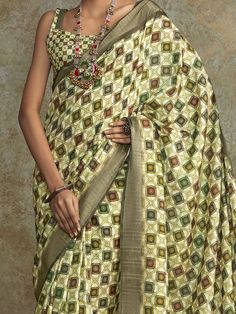 Celebrate your upcoming festivals, events, and any occasion with this beautifully designed multi-color silk saree with sequin and digital print work. The saree comes with a matching silk blouse featuring similar sequin and digital print work, creating a cohesive and elegant look.
This set includes 5.50 meters of saree material and unstitched blouse material, allowing you to customize the fit to your preferences. The vibrant colors and intricate detailing on this saree make it perfect for both ca Multicolor Silk Pre-draped Saree With Zari Work, Bollywood Style Digital Print Pre-draped Saree For Diwali, Festive Multicolor Unstitched Pre-draped Saree, Designer Multicolor Tussar Silk Pre-draped Saree, Multicolor Anarkali Style Pre-draped Saree With Printed Motifs, Designer Wear Blouse With Printed Motifs For Navratri, Navratri Silk Lehenga With Digital Print, Navratri Designer Blouse With Printed Motifs, Designer Multicolor Tissue Silk Pre-draped Saree