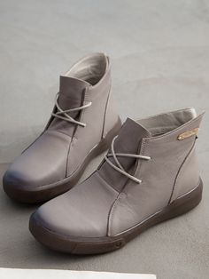 With the skid-resistant soles and genuine leather material, these ankle boots are a must-have for your casual, cool-weather wardrobe for this cozy weather. 1.18" heel 11.4'' circumference Leather upper Leather lining Lace-up closure TPU sole Trendy Boots, Reindeer Headband, Grey Shoes, Trendy Accessories, Dress Jewelry, Boot Shop, Leather Ankle Boots, Chukka Boots, Leather Material