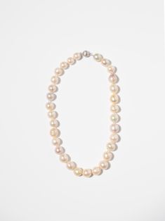 Add a touch of sophisticated, timeless beauty to your wardrobe with our Pink Pearl Necklace. Elevate any outfit with this elegant piece! 18 inches long Freshwater Pearls Luxury Bridal Pearl Chain Necklace, Classic Long Necklace For Weddings, Luxury Long Necklace For Formal Occasions, Classic Single Strand Pearl Necklace For Formal Occasions, Formal Single Strand Pearl Bridal Necklace, Formal Bridal Necklace With 17 Jewels, Elegant Pearl Necklaces With Round Beads, Classic Long Pearl White Necklace, Elegant Long Single Strand Pearl Necklace