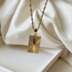 TIMELESS- This exquisite 18k gold necklace is the epitome of sophisticated style and minimalism. Delicately crafted by hand, the dainty chain and timeless design make it a truly timeless piece.  It's waterproof, anti tarnish, and adjustable, making it perfect for everyday wear. The perfect accessory to elevate any look.  ☆Waterproof  ☆Hypoallergenic ☆Anti tarnish ☆40cm + 5cm extension for extra comfort and styling ✨ABOUT CRESCENT JEWELRY DESIGNS All jewelry is made by Crescent Jewelry Designs in the heart of Nashville Tennessee. Designing unique and beautiful jewelry is our passion, and our goal is to make sure you are 100% satisfied with the products. Each piece is made with hypoallergenic earring posts and free from lead and nickel. If you have any questions or concerns regarding the pro Minimalist Square Pendant Necklace As Gift For Her, Minimalist Tarnish Resistant Necklace As Gift For Her, Dainty Gold-plated Necklace With Rectangular Pendant, Minimalist 14k Gold Filled Necklace As Gift For Her, Dainty Gold Plated Necklace With Rectangular Pendant, Dainty Square Pendant Chain Necklace As Gift, Minimalist Rectangular Necklace As Gift For Her, Minimalist Rectangular Necklaces As Gift For Her, Minimalist Initial Pendant Chain Necklace Gift