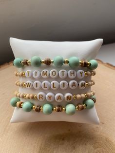 Our 5 stack MINT-TO-BE boho stack! These are super stylish, comfortable and perfect for daily wear! Such a chic boho-look! (These are meant to fit snug. If you would like them to feel loose and move around on your wrist, please size up). Each bracelet is carefully handmade with high quality materials: -8mm natural wood beads (mint color) -4mm natural wood beads -natural wood heishi beads -3mm gold hematite beads -7mm white/gold acrylic letters (other color options available- see pic) -Cord: high Turquoise Bracelet With Wooden Beads For Gift, Turquoise Bracelet With Wooden Beads, Everyday Personalized Bohemian Friendship Bracelets, Customizable Green Jewelry For Everyday Wear, Customizable Green Jewelry For Everyday, Bohemian Personalized Name Bracelet As Gift, Bohemian Personalized Name Bracelet For Gift, Personalized Bohemian Name Bracelet For Gift, Bohemian Personalized Name Bracelet Gift