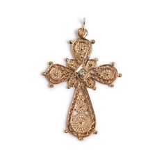 A beautifully hand crafted cross with exquisite detail on both the front and the back.  Very slim and refined 14KT Gold braided wire work decorates each arm of the cross.  A diamond set center adds a bit of sparkle and the borders have tiny balls to give them extra dimension.  Both front and rear display the fine handed detail.   I've recently had this lovely pendant polished and brought back to its original glory.  While I am not certain of its age, it is clearly a hand-crafted gem.  34mm heigh Diamond Cross Pendants, Diamond Cross, Diamond Set, Wire Work, 14kt Gold, Cross Pendant, Pendant Necklaces, Borders, Jewelry Necklace Pendant