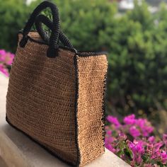 Crochet travel tote bag knitted with paper rope.  You can also carry this Large market bag by hand.  But I put an adjustable leather handle that you can carry on your shoulder if you want.   If you want this bag, you can use it in the city, if you want to go to the beach, if you want to go to the grocery store.   Mothers with children may also have a preference. This two color boho style bag is 100% handmade.   There may be a tonal difference in the color of the strands. Dimensions of the bag he Eco-friendly Beach Bag With Braided Handles, Rectangular Jute Beach Bag With Braided Handles, Square Jute Bag With Braided Handles, Eco-friendly Large Capacity Crochet Travel Bag, Rectangular Jute Beach Bag With Large Capacity, Square Jute Bags With Braided Handles, Jute Straw Bag With Leather Handles For Shopping, Casual Jute Crochet Bag For Travel, Jute Crochet Bag For Daily Use