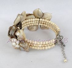 "Applications: wedding, engagement, daily wear,party Material: Pearl, shell,Turquoise beads beads size :4-6-8mm,15*15mm Bracelet Size:6.5-7\"+2\"Extend the chain Color: As show We can adjust the length of your requirements All the product are designed and made by myself so if you want any adjustments in length or style, don't forget to contact me. Otherwise, I will send you the one in the picture. Welcome wholesale and customization. We can customize according to your requirements. Payment We ac Pearl White Shell Jewelry Gift, White Shell-shaped Bracelet For Gift, White Shell-shaped Bracelet As A Gift, Adjustable Shell-shaped Pearl White Jewelry, Adjustable Pearl White Shell Jewelry, Handmade Shell Jewelry For Wedding, Beaded Mother Of Pearl Shell As Gift, Mother Of Pearl Beaded Shell As Gift, Pearl Shell Jewelry For Weddings