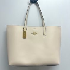 Selling A Light Beige Large Coach Tote Bag. Perfect For Work, School Or Vacation. Has A Beautiful Dark Blue Interior With Gold Accents. Luxury Neutral Bags For Formal Occasions, Luxury Neutral Bags, Classic Neutral Bag For Formal Occasions, Classic Neutral Formal Bag, Designer Top Handle Bag In Neutral Color, Designer Neutral Top Handle Bag, Neutral Designer Top Handle Bag, Luxury Cream Bags For Errands, Designer Rectangular Neutral Bags