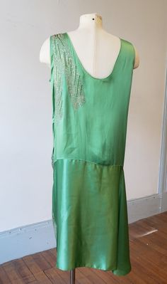 Green Bias Cut Slip Dress For Evening, Green Sleeveless Slip Dress With Bias Cut, Art Deco Sleeveless Dress For Vintage Events, Elegant Green Flapper Dress For Evening, Green Bias-cut Slip Dress For Wedding, Green Silk Slip Dress For Wedding, Green Sleeveless Bias-cut Evening Dress, Green Sleeveless Evening Dress With Bias Cut, Green Sleeveless Bias-cut Dress