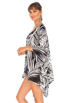 Having a stylish beach cover up is a must! The beautifully printed tunic beach coverup creates a vibrant look. Easy to pull on and easy to pack. Making clothes for the traveling woman. Boho design Lightweight beach dress Semi-Sheer Hand wash in cold water, hang to dry Flowy Black Summer Cover-up, Long Sleeve Swim Dress For Beach, Printed Beach Cover-up With Kimono Sleeves, Tropical Long Sleeve Cover-up For Beach Season, Long Sleeve Beachwear Swim Dress For Beach Season, Long Sleeve Swim Dress For Beach Season, Long Sleeve Swim Dress For Summer Vacation, White Upf 50+ Beachwear Cover-up, Long Sleeve Beach Cover-up For Vacation