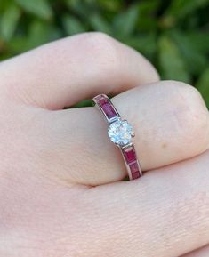 Vintage Unusual Diamond and Baguette Ruby Ring set in 18ct Gold. Stunning for engagement or Ruby Wedding Anniversary. Please look carefully the photographs as we have taken care to capture any quirks or "imperfections" - all our items are commensurate with the age. Vintage and antique jewellery is unlikely to be absolutely perfect, but that's why it's so charming!  Our beautiful silver, gold and platinum rings can be resized for an additional cost - please see our "Ring Resizing" listing in our Baguette Cut Cubic Zirconia Diamond Ring For Proposal, Cubic Zirconia Baguette Cut Diamond Ring For Proposal, Baguette Cut Cubic Zirconia Proposal Ring, White Ruby Ring With Center Stone, Luxury Ruby Ring Channel Set For Anniversary, Luxury White Ruby Ring With Brilliant Cut, White Ruby Ring With Prong Setting For Wedding, White Ruby Ring With Center Stone For Anniversary, White Ruby Ring With Vvs Clarity