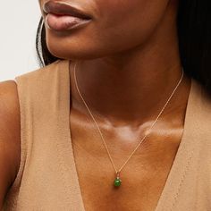 Simply designed, this jade bead and diamond accent pendant is a striking look. 10K gold 8.0mm round Nephrite jade bead with diamond accent 18.0-inch rope chain; spring-ring clasp Gold Jade Necklace, Nephrite Jade, Jade Necklace, Jade Beads, Rope Chain, 10k Gold, Spring Rings, Jade, Chain