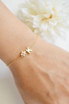 Super Dainty Personalized Cherry Blossom initial bracelet.▶ Material - Gold plated over brass▶ Chain Length - 5 ~ 9 inches adjustable▶ Measure - Flower 6mm  Letter H 7mm x W. 5mm▶The matching necklace available from following link.https://www.etsy.com/listing/558720665/personalized-cherry-blossom-initia▶The matching earrings available from following link.https://www.etsy.com/listing/558720665/personalized-cherry-blossom-initial▶ The jewelry comes in a gift box** Please check the shop policy for Flower Girl Bracelet, Cute Personalized Jewelry As A Gift For Her, Delicate Personalized Name Bracelet As A Gift, Personalized Delicate Name Bracelet As A Gift, Dainty Name Bracelet For Bridesmaid Gift, Delicate Personalized Name Bracelet As Gift, Delicate Personalized Name Bracelet For Gift, Personalized Dainty Name Bracelet As Gift For Her, Dainty Name Bracelet With Initials As Gift