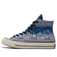 Introducing the Converse Chuck Taylor All Star 1970s high top sneaker in Midnight Navy. This limited edition sneaker is inspired by knitwear, and features a premium organic cotton-canvas upper with a screen-printed fair isle-sweater graphic in blue and lavender hues. The festive design is complemented by classic Chuck 70 details, including a rubber toe cap, winged tongue stitching and an All Star patch on the medial ankle. The sneaker rides on an off-white rubber midsole with a reinforced toe bu 1970s Sneakers, Sweater Graphic, Blue High Tops, White Canvas Shoes, Blue And Lavender, Limited Edition Sneakers, Converse Chuck 70, High Top Sneaker, Festive Design