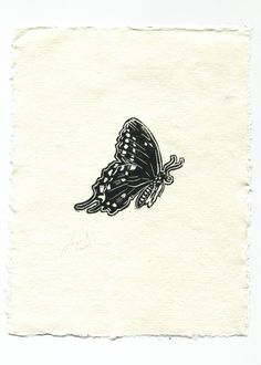 a black and white drawing of a butterfly