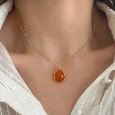 ✔️Raw Carnelian Pendant in a Satellite chain✔️ This is a Real carnelian necklace with a Natural carnelian crystal. Are your looking for  Birthday gifts or for a  Gemstone necklace for you? This natural carnelian crystal necklace is a great idea.  You will love this bright orange color of nature. High-Quality 925 Sterling Silver * Finish 24K Gold  A unique raw carnelian necklace. This natural carnelian pendant  is great for wearing alone or layered with other stacking necklaces. It is the perfect Orange Gemstone Drop Jewelry, Orange Gemstone Necklaces As A Gift, Orange Drop Gemstone Jewelry, Orange Agate Gemstone Necklace, Orange Agate Necklace For Gift, Amber Crystal Necklace For Gift, Elegant Orange Agate Necklace, Elegant Orange Crystal Necklace As A Gift, Elegant Orange Crystal Necklace For Gift