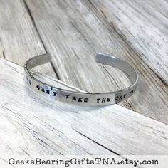 "\"Burn the land and boil the sea...\" Fans of Josh Whedon's TV series Firefly will love this hand hammered, hand stamped aluminum cuff bracelet. Even non-fans will appreciate the defiant sentiment from the show's theme song. This cuff style bracelet is a quarter inch wide (perfect for stacking with other bracelets) and a full 1/16 of an inch thick. Thicker and more resistant to bending than similar aluminum cuffs." Hand Stamped Cuff Bracelet, Minimalist Bracelet, Les Sentiments, Hammered Copper, Theme Song, Firefly, Bending, Fashion Bracelets, Hand Stamped