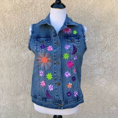 Nwt Diane Gilman Colorful Embroidery Blue Denim Vest Size: Small -Snap Buttons -Beautiful And Colorful Floral And Moon Embroidery In New With Tag Condition! Any Questions? Feel Free To Ask! Thanks So Much For Looking! Spring Festival Denim Blue Outerwear, Summer Floral Embroidery Medium Wash Outerwear, Summer Outerwear With Floral Embroidery In Medium Wash, Multicolor Denim Jacket For Spring, Spring Multicolor Denim Jacket, Multicolor Patched Denim Jacket For Spring, Multicolor Denim Jacket With Patches For Spring, Casual Embroidered Denim Vest For Spring, Bohemian Blue Denim Jacket With Patches