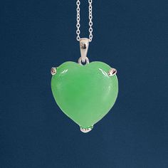 A stunning silver green jade heart necklace personalised with an optional engraved tag Featuring a stunning natural jadeite gemstone as it's centrepiece, this heart necklace is crafted from the finest polished sterling silver and is suitable for almost any age. The Jade gemstone, the 12th and 35th wedding anniversary stone, is said to promote the flow of positive energy while warding off negative vibrations. It's believed to soothe the mind, release irritability, and inspire feelings of peace. W 35th Wedding Anniversary, Jade Charm, Jade Gemstone, Jade Necklace, Natural Jade, Jade Pendant, Green Jade, Modern Pendant, Heart Pendant Necklace