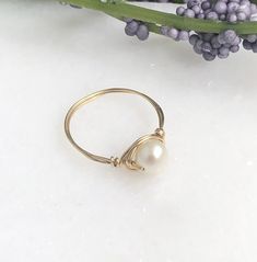 This ring is made by wire wrapping 14k gold filled wire around a single, pearl bead. Please indicate the size you would like. Single Pearl, Wire Wrapped Ring, Beaded Collar, Wire Wrapped Rings, Gold Glass, Wrap Rings, May 5, Moon Stone, Perfect Ring