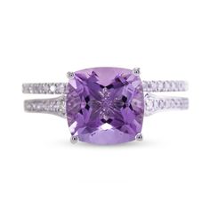 Let your affection shine vibrantly in this eye-catching white gold cushion-cut purple amethyst and diamond bridal set. Created in 14K white gold The engagement ring glistens with a 9.0mm cushion-cut bright purple amethyst. Diamonds line the tapered shank for added shimmer. The coordinating diamond wedding band completes this 1/6 ct. t.w. diamond bridal set. Purple Sapphire Zales, Amethyst And Diamond Engagement Ring, Classic Cushion Cut Amethyst Jewelry, Cushion Cut Amethyst Fine Jewelry, Cushion Cut Diamond Gemstones For Fine Jewelry, Cushion Cut Diamond Fine Jewelry, Purple Cushion Cut Brilliant Ring, Fine Jewelry Cushion Cut Amethyst, Fine Jewelry With Cushion Cut Amethyst