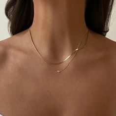 the layering set for the ultimate 14k gold lover. 16" solid 14k yellow gold super dainty herringbone necklace + 16-18" adjustable solid 14k yellow gold necklace with a lab grown diamond (see different lengths in images). snag at a discount when purchased as a set. handmade with recycled metals in the usa. due to its delicate nature, you may want to remove the herringbone piece while sleeping. Diamond Necklace Layering, Layering Diamond Necklaces, 14k Yellow Gold Necklace, Herringbone Necklace, Diamond Necklace Set, Necklace Layering, Delicate Jewelry, Adjustable Necklace, Diamond Fashion