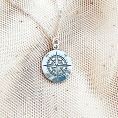 "Looking for a stylish accessory that you can wear every day ? Look no further than this gorgeous and dainty COMPASS necklace! Made of 925 sterling silver, this necklace features a sun compass pendant that's both elegant and practical. Engraved clearly and perfect to combine with other minimalist necklaces, this trendy pendant is also a great gift for any travel lover or globetrotter. Plus, it's also available as a bracelet, making it a versatile addition to your jewelry collection. ♡ DETAILS  P Symbolic Sterling Silver Engraved Charm Necklaces, Compass Design Pendant Jewelry As Gift, Compass Design Pendant Jewelry Gift, Sterling Silver Locket Charm Necklace, Silver Sterling Silver Locket Charm Necklaces, Silver Sterling Silver Locket Charm Necklace, Sterling Silver Medallion For Personalized Gift, Stamped 925 Silver Pendant Charm Necklace For Gift, Stamped 925 Pendant Charm Necklace As Gift