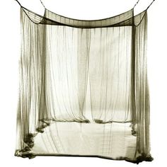 a bed with sheer curtains hanging over it's headboard and foot board in front of a white background