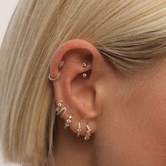 For the girl who sets her own style rules: Meet the Tate earring set. With its six-piece collection of all-asymmetrical pieces, you’re free to create a look that’s uniquely yours. Forget left and right—mix and match to your heart’s content and embrace your own fashion freedom. Created with a sterling silver base and utilizing luxury 14 karat gold plating, this Adorn Luxe hoop earring set can be enjoyed season after season. Silver Earrings Stack Aesthetic, Earring Set Up, Gold Earrings Stack, Earring Sets, Earrings Stack, Mixed Metal Earring Stack, Earring Stacks, Earring Stack, Silver Earring Stack