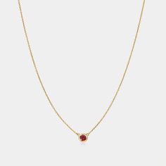 Embrace the passion and love with our Garnet Solitaire Birthstone Necklace. Its deep, rich red hue symbolizes love, friendship, and devotion. Garnet radiates energy, passion, and warmth. The perfect gift for anyone born in January. Gemstone: Natural Garnet Month: January Pendant dimensions: .21" x .21" (5.3mm x 5.3mm) Chain length: 16" (40.5cm), extends to 18" (45.5 cm) Please note, natural gemstones may vary in color. Classic Red 14k Gold Necklace, Luxury Red Necklace For Gift, Luxury 14k Gold Red Necklace, Luxury Red 14k Gold Necklace, Red Ruby Gemstone Necklaces, Red Ruby Gemstone Necklace, Luxury Red Sterling Silver Necklace, Ruby Clavicle Chain Jewelry As Gift, Ruby Clavicle Chain Jewelry Gift