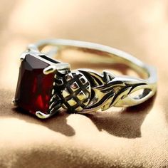 This exquisite Scottish thistle vintage simulated ruby ring is crafted in 925 solid sterling silver. The stunning princess cut ruby centerpiece measures 8x6mm, and the ring is stamped with the 925 hallmark, indicating its high quality and purity. Scottish Thistle, Beautiful Birthday, Red Band, Anniversary Present, Celtic Jewelry, Birthday Gift For Him, Ruby Ring, Princess Cut, Beautiful Rings